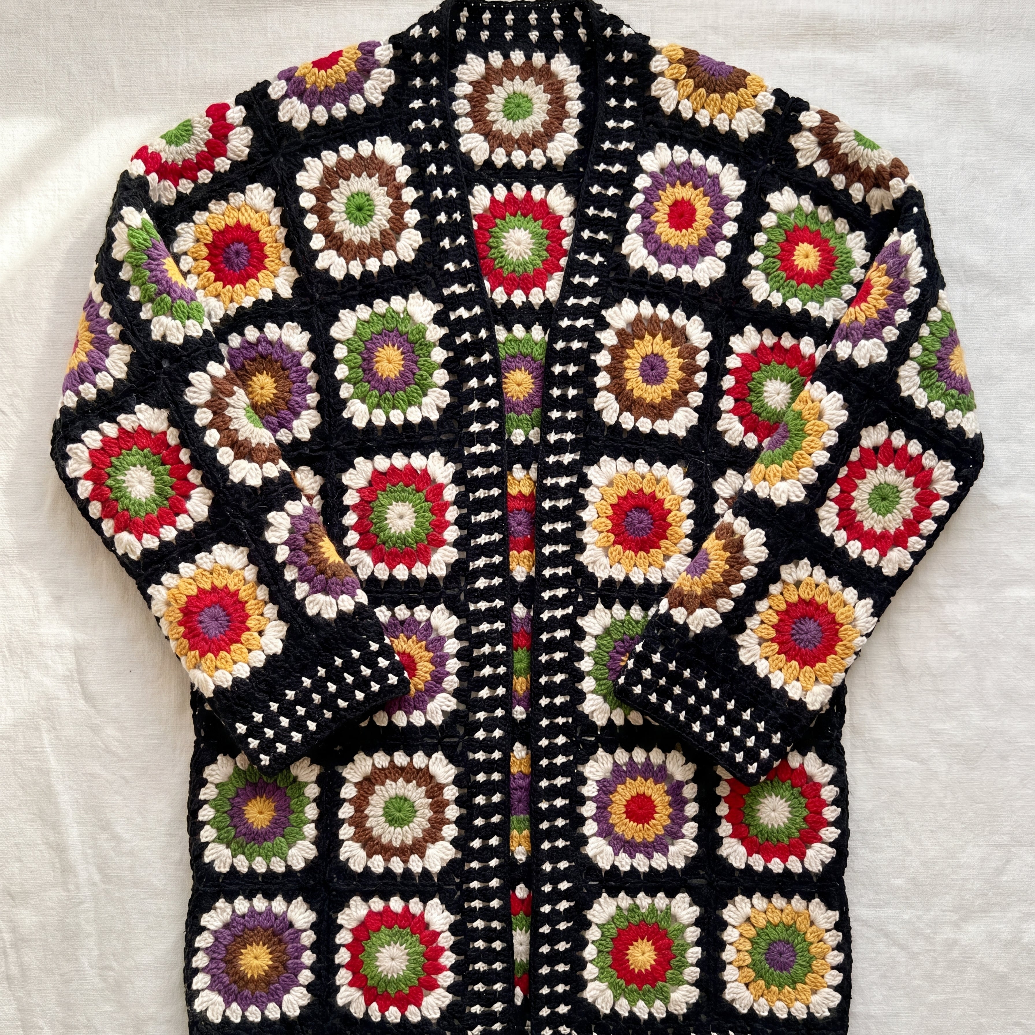 The Mira hand-crocheted organic cotton cardigan by Ana Chic