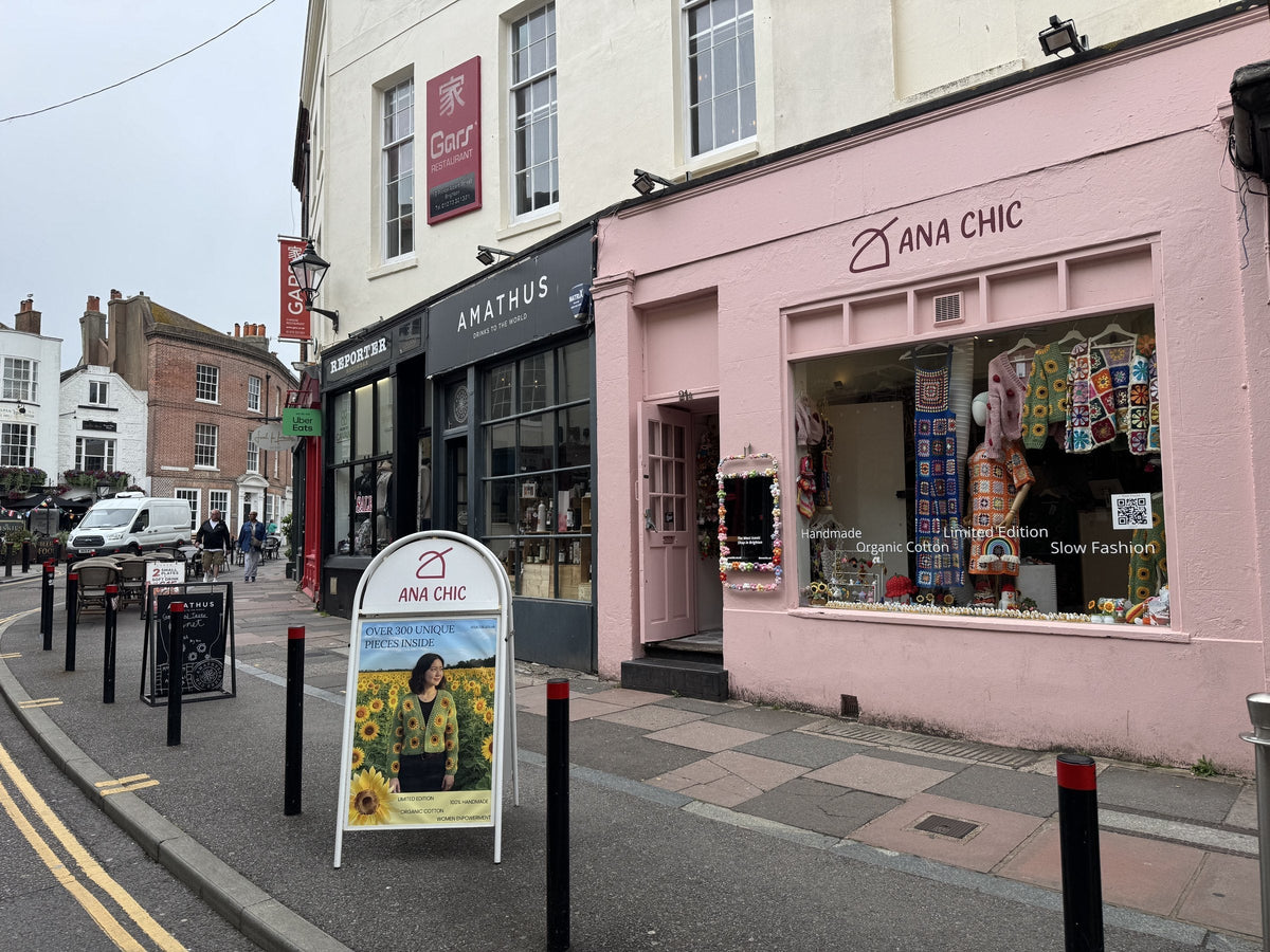 The pink shopfront of Ana Chic at 21A Prince Albert Street in Brighton's Lanes, with hand-crocheted pieces in the window