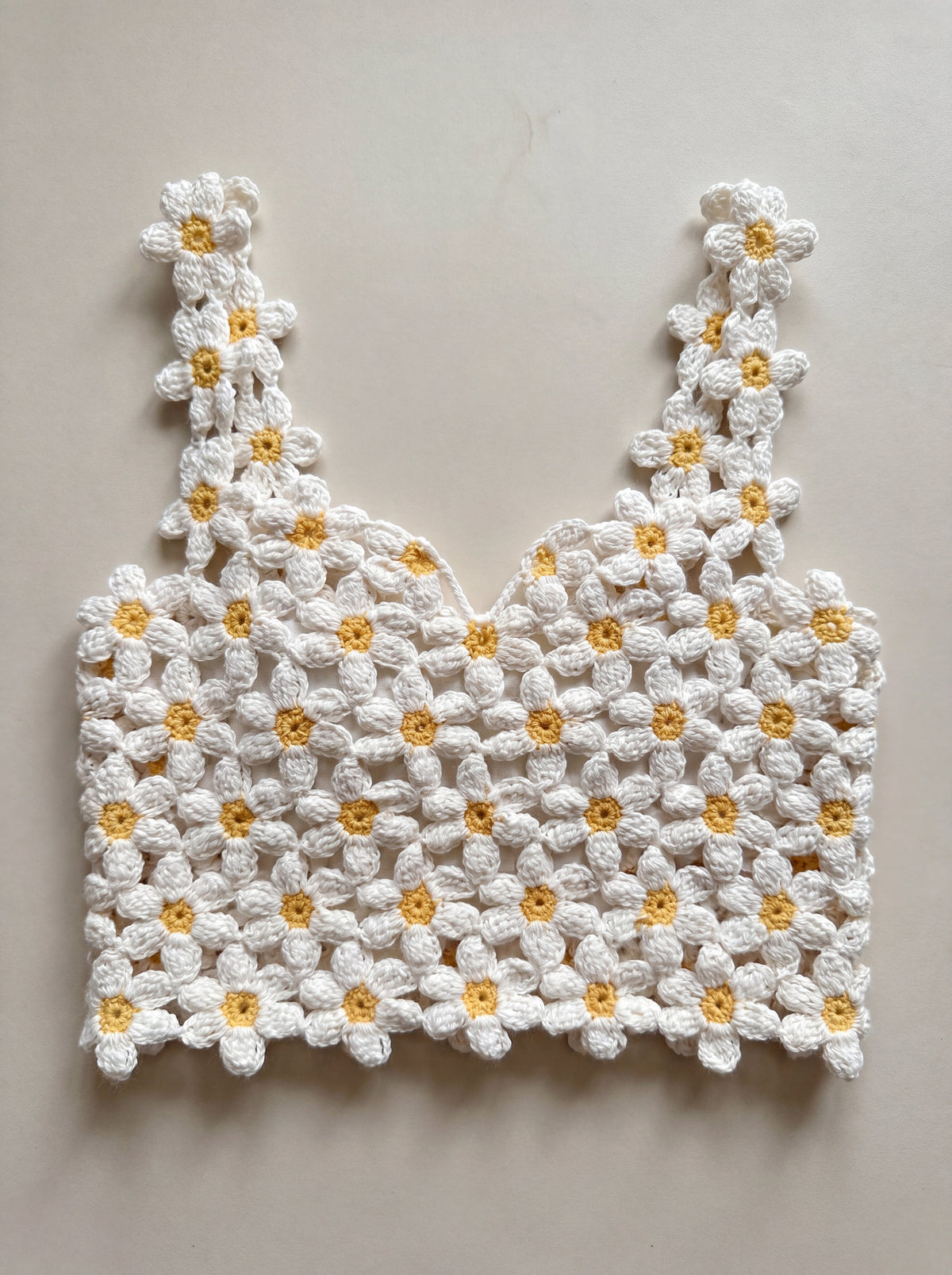A hand-crocheted daisy top by Ana Chic