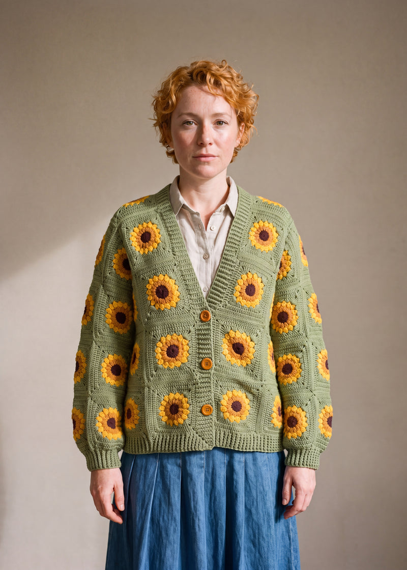 Oversize Sunflower Cardigan - Sage squares crocheted granny square cardigan with raised crochet sunflowers, worn by Ana Chic