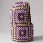 Sand and plum granny square balaclava standing on its own, back view of the hood — handmade by Ana Chic