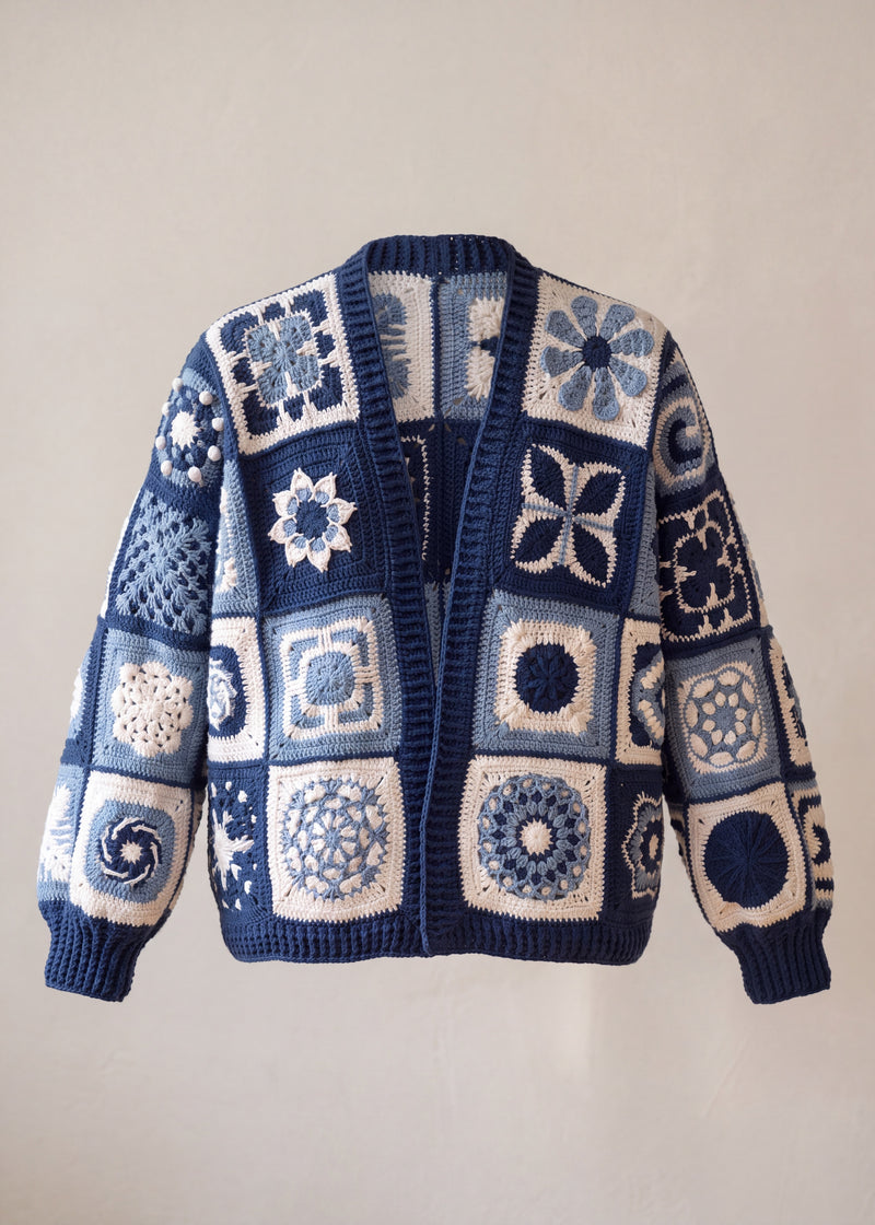 Navy and white granny-square cardigan with ribbed navy collar and cuffs, front view - handmade by Ana Chic