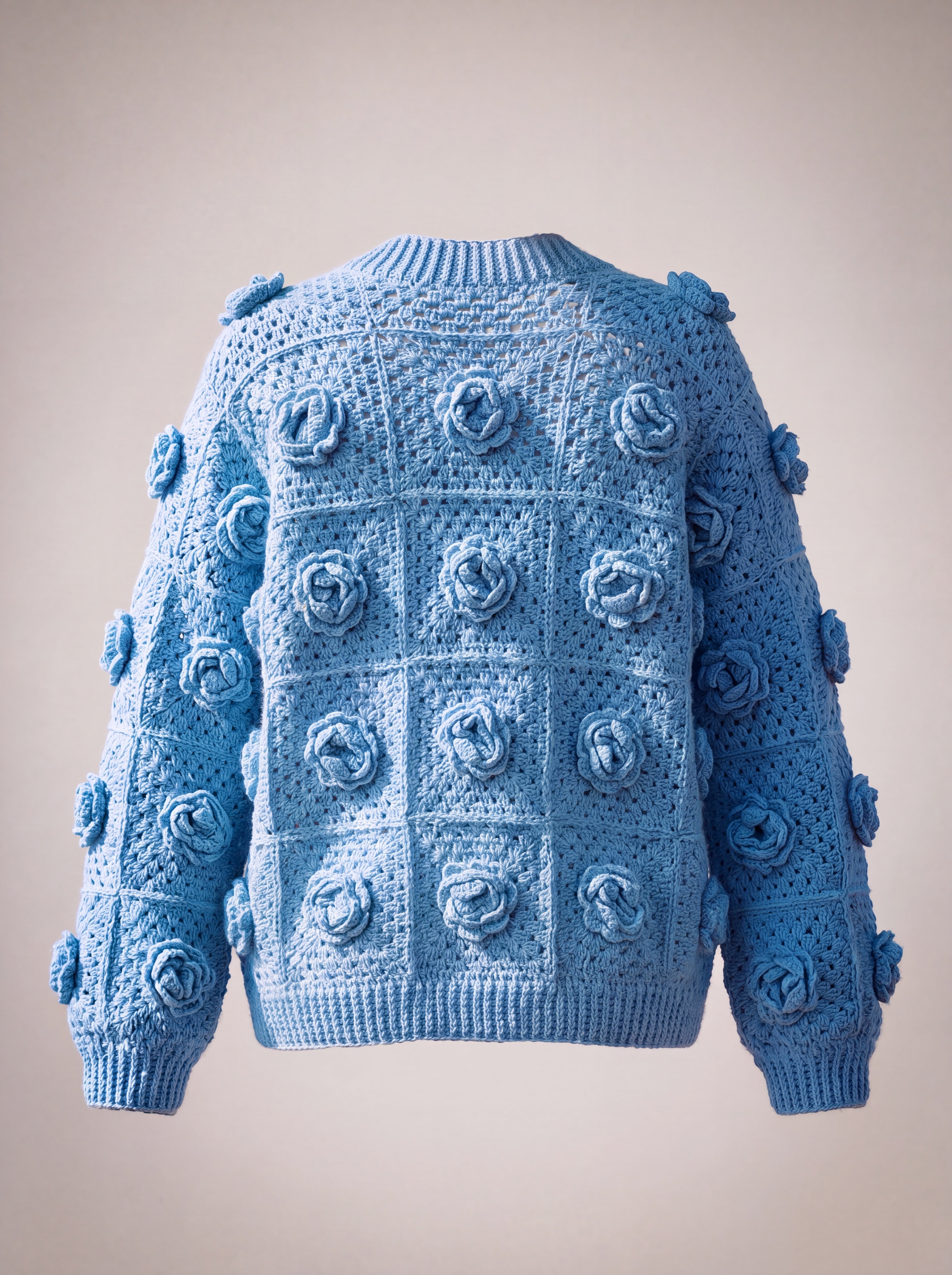 Back of the cornflower blue rose granny square cardigan with ribbed hem and cuffs — handmade by Ana Chic