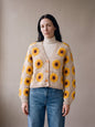 Crop Sunflower Cardigan - Beige - Oatmeal-cream squares crocheted granny square cardigan with raised crochet sunflowers, worn by Ana Chic