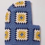 Denim blue and mustard granny square balaclava laid flat, side view of the hood — handmade by Ana Chic