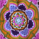 Close-up of the crocheted medallion on the pink crochet tote bag — handmade by Ana Chic