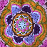 Close-up of the crocheted medallion on the pink crochet tote bag — handmade by Ana Chic