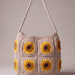 Back of the beige crochet crossbody bag with its sunflower squares and adjustable strap — handmade by Ana Chic