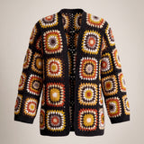 Black Boho Cardi front, open granny-square crochet cardigan in rust, mustard and cream