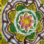 Close-up of the crocheted medallion on the green crochet tote bag — handmade by Ana Chic