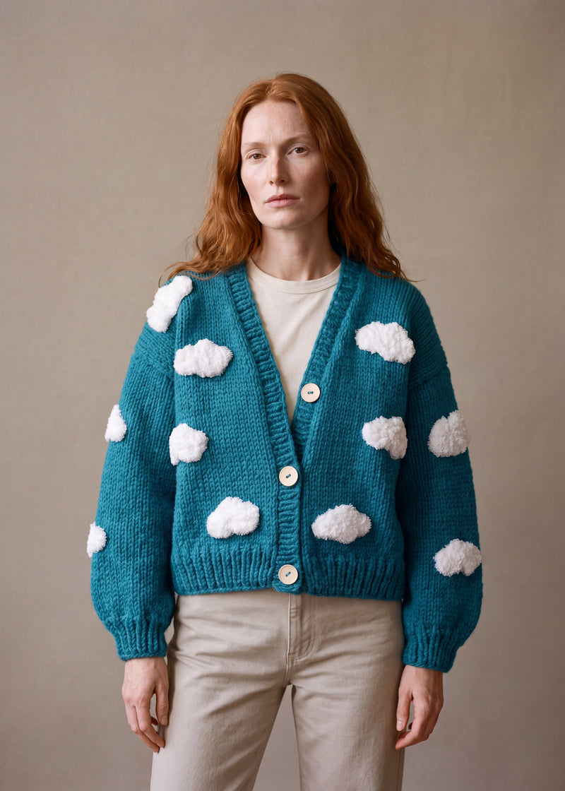 Clouds Knit Cardigan - deep teal blue chunky hand-knitted wool cardigan with crocheted motifs, worn open over a plain top by Ana Chic