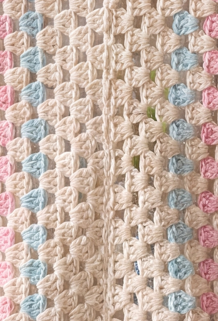 Close-up of the centre back seam of an ecru hexagon crochet cardigan, turquoise and baby pink granny-cluster stripes - handmade by Ana Chic