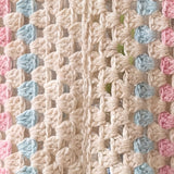 Close-up of the centre back seam of an ecru hexagon crochet cardigan, turquoise and baby pink granny-cluster stripes - handmade by Ana Chic