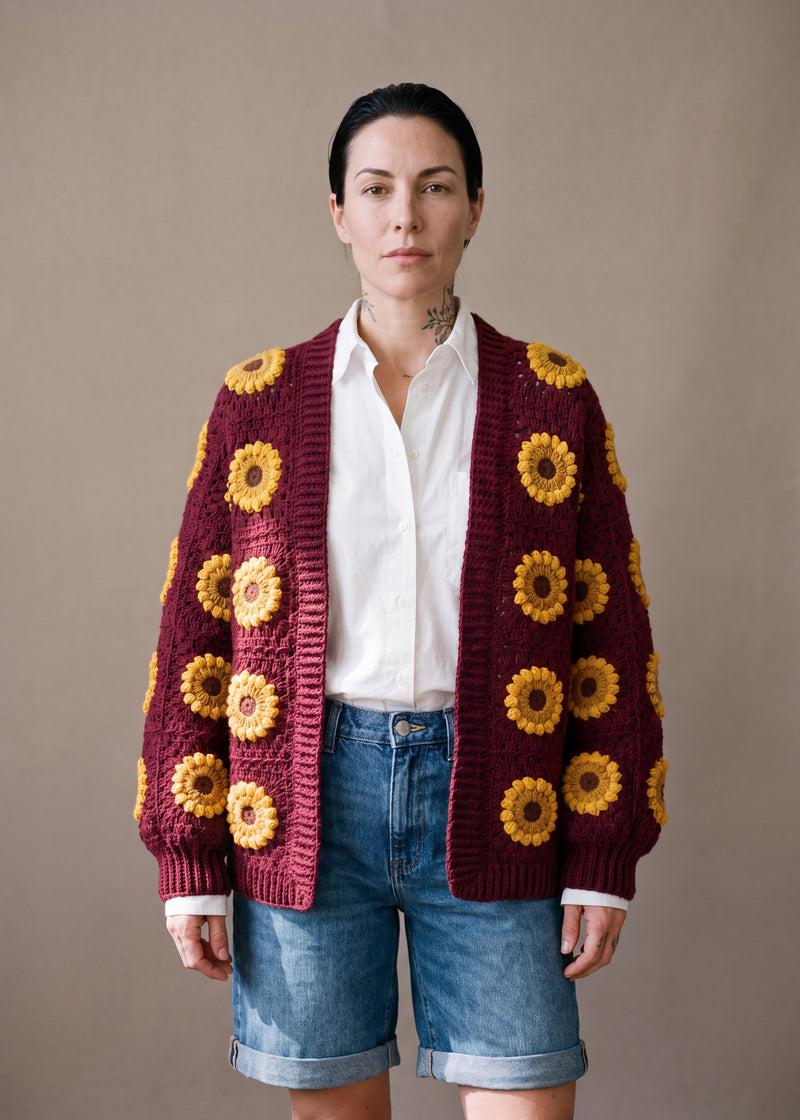 3D Sunflower Burgundy Cardigan - Deep burgundy crocheted granny square cardigan with raised crochet sunflowers, worn by Ana Chic