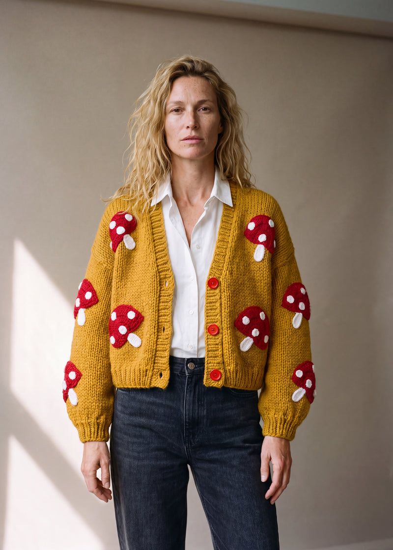 Mushroom– Chunky Wool Hand-Knitted Cardigan - golden mustard yellow chunky hand-knitted wool cardigan with crocheted motifs, worn open over a plain top by Ana Chic