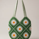 Front of the green crochet shoulder bag with daisy granny squares and two sage-green straps — handmade by Ana Chic