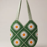 Front of the green crochet shoulder bag with daisy granny squares and two sage-green straps — handmade by Ana Chic