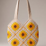 Back of the cream crochet shoulder bag with its sunflower granny squares and cream shoulder straps — handmade by Ana Chic