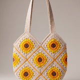 Back of the cream crochet shoulder bag with its sunflower granny squares and cream shoulder straps — handmade by Ana Chic