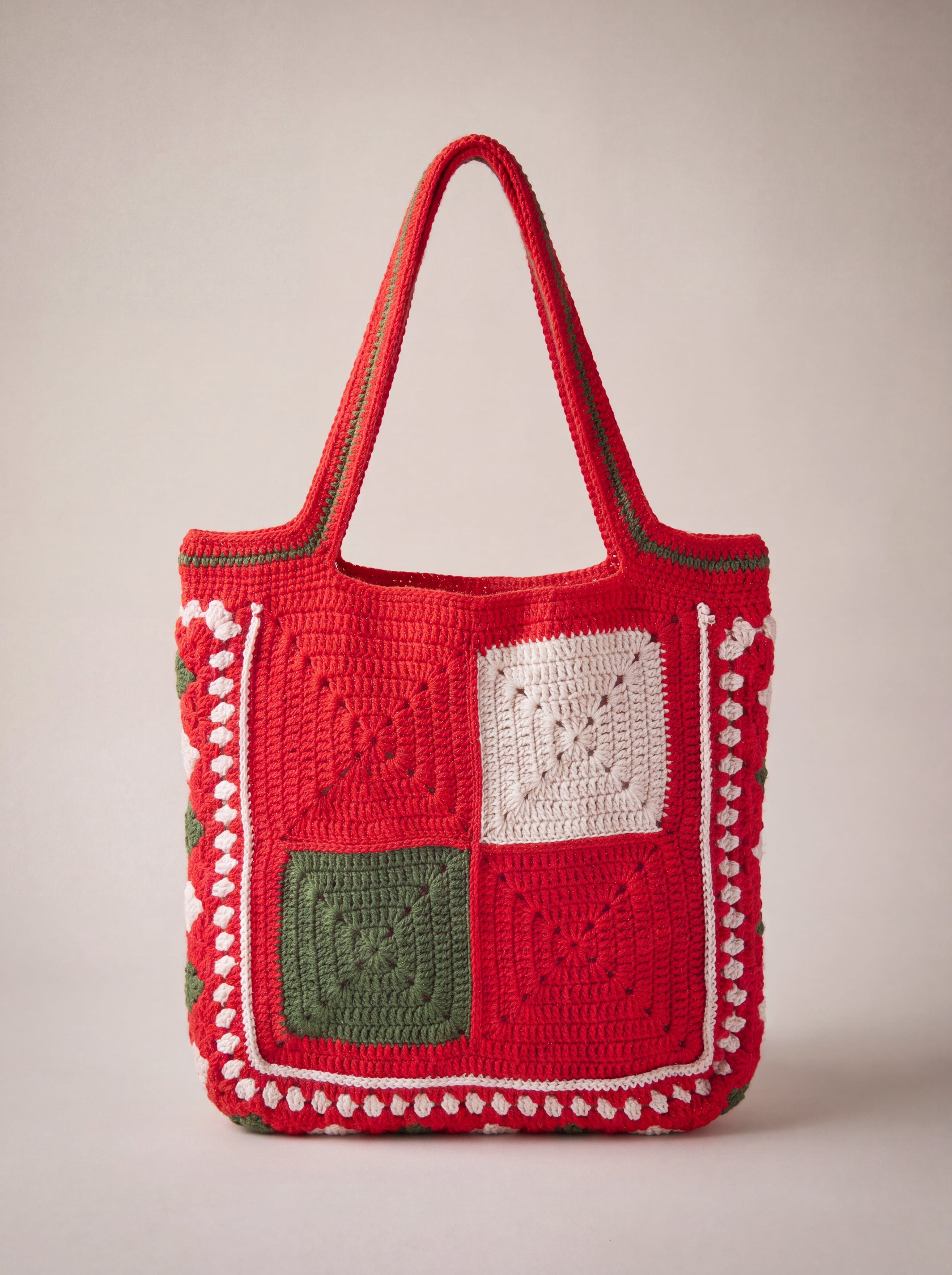 Back of the red crochet tote bag with four plain granny squares — handmade by Ana Chic