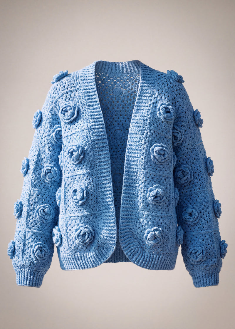 Cornflower blue granny square cardigan with a raised crochet rose on every square, front view — handmade by Ana Chic