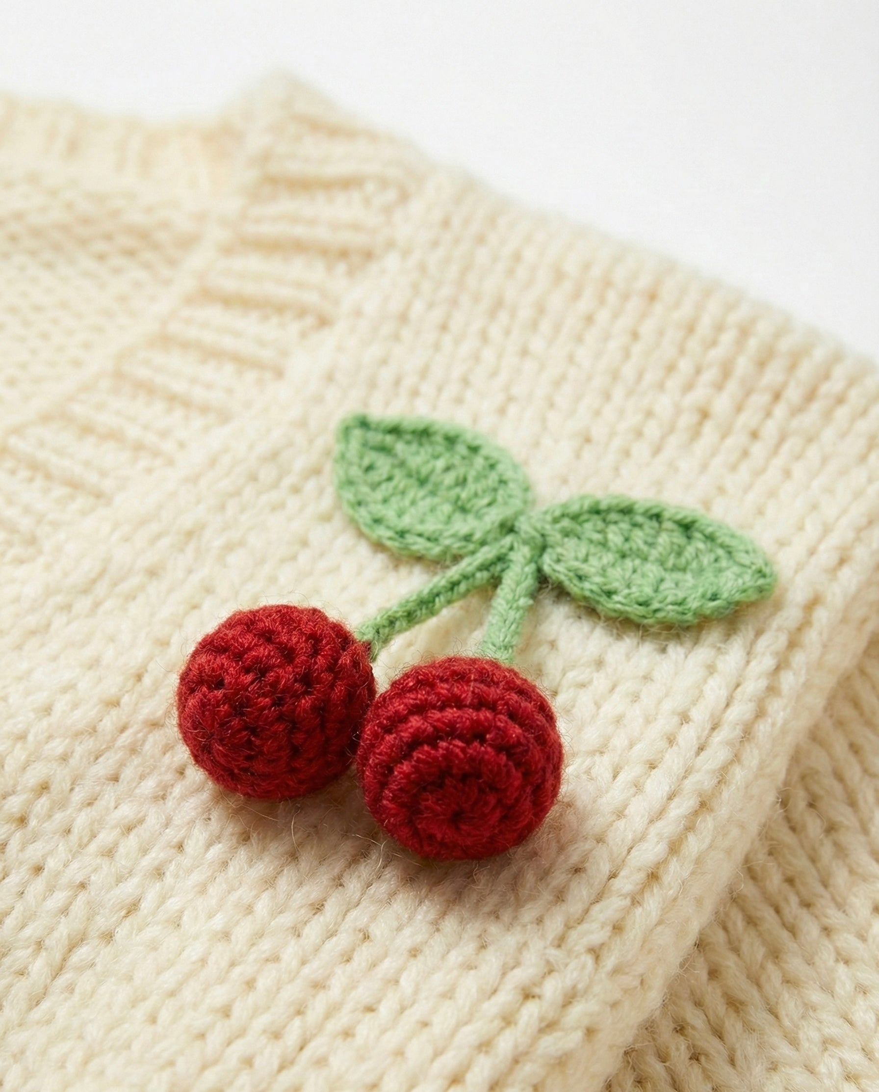 Cherry Knitted Cardigan — handmade organic cotton knit cardigan by Ana Chic, styled view