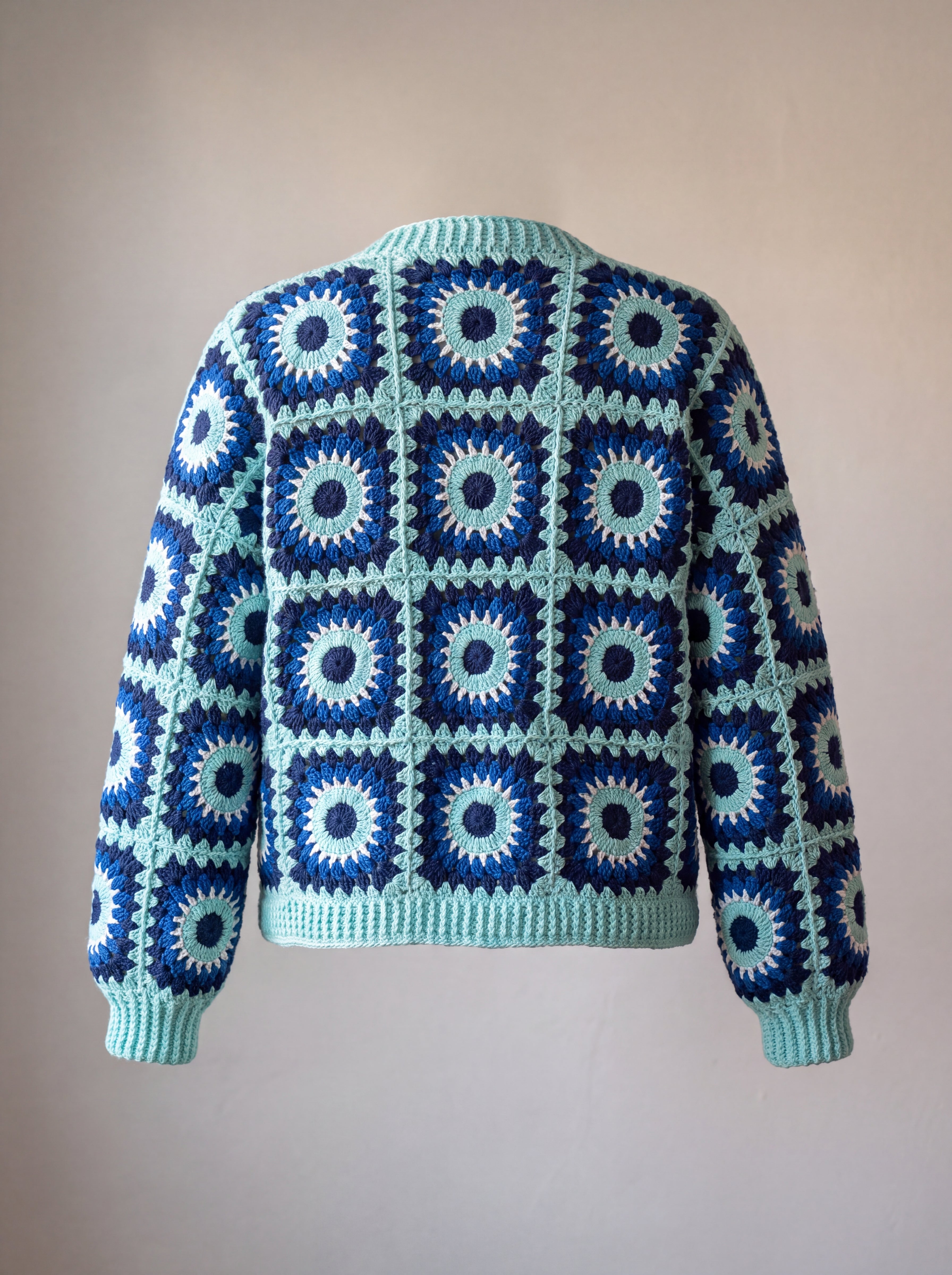 Back of the navy and aqua Ribbed Cuff Cardigan with aqua joins, ribbed hem and cuffs - handmade by Ana Chic