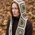 Cream granny-square crochet hooded scarf worn with the hood up and the tails down the front — handmade by Ana Chic