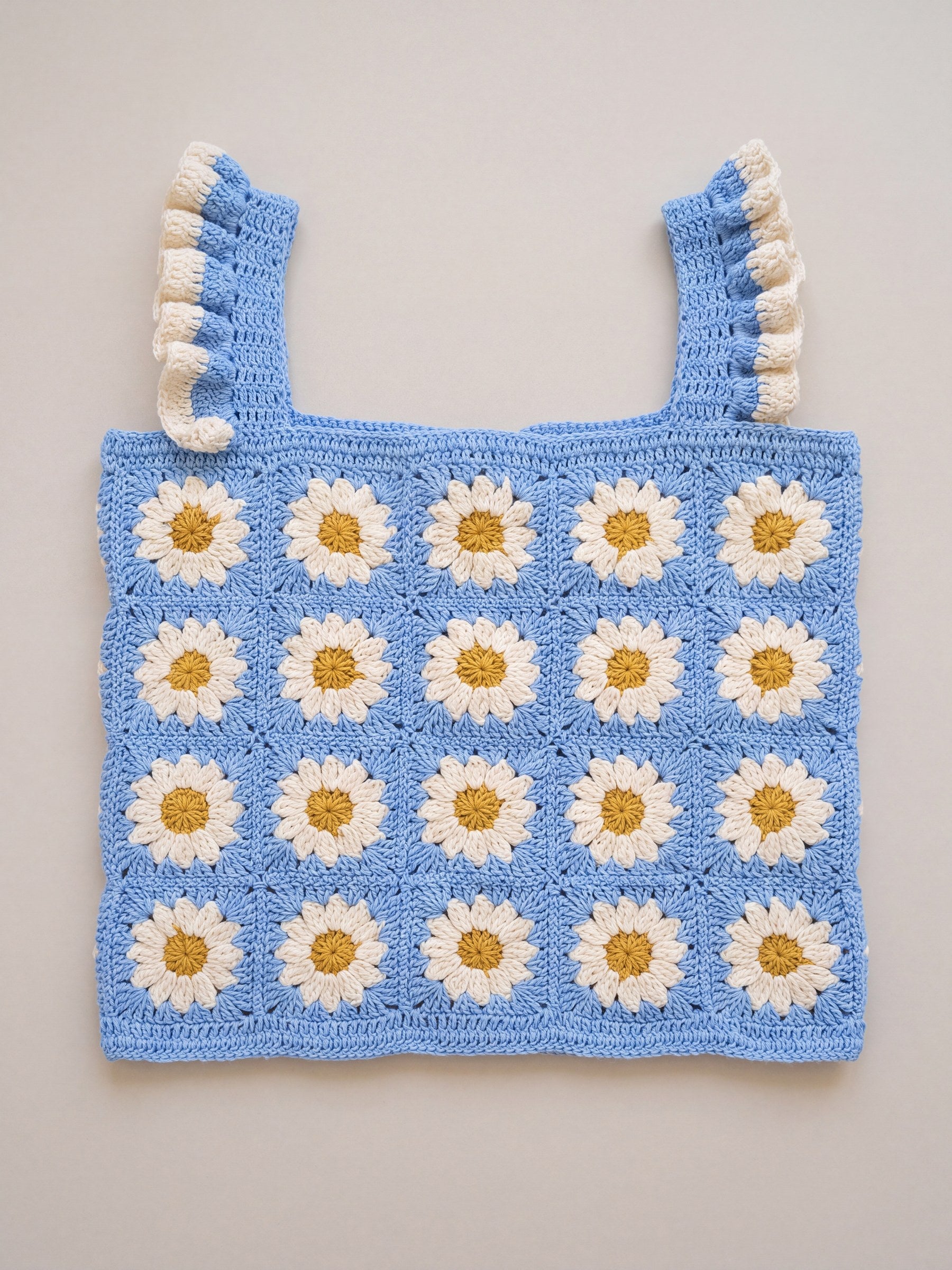 Blue Daisy Crochet Top, front: cream daisy granny squares on cornflower blue with ruffle straps — handmade by Ana Chic