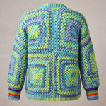 Back of a lime, aqua and denim-blue granny square cardigan with rainbow cuffs — handmade by Ana Chic