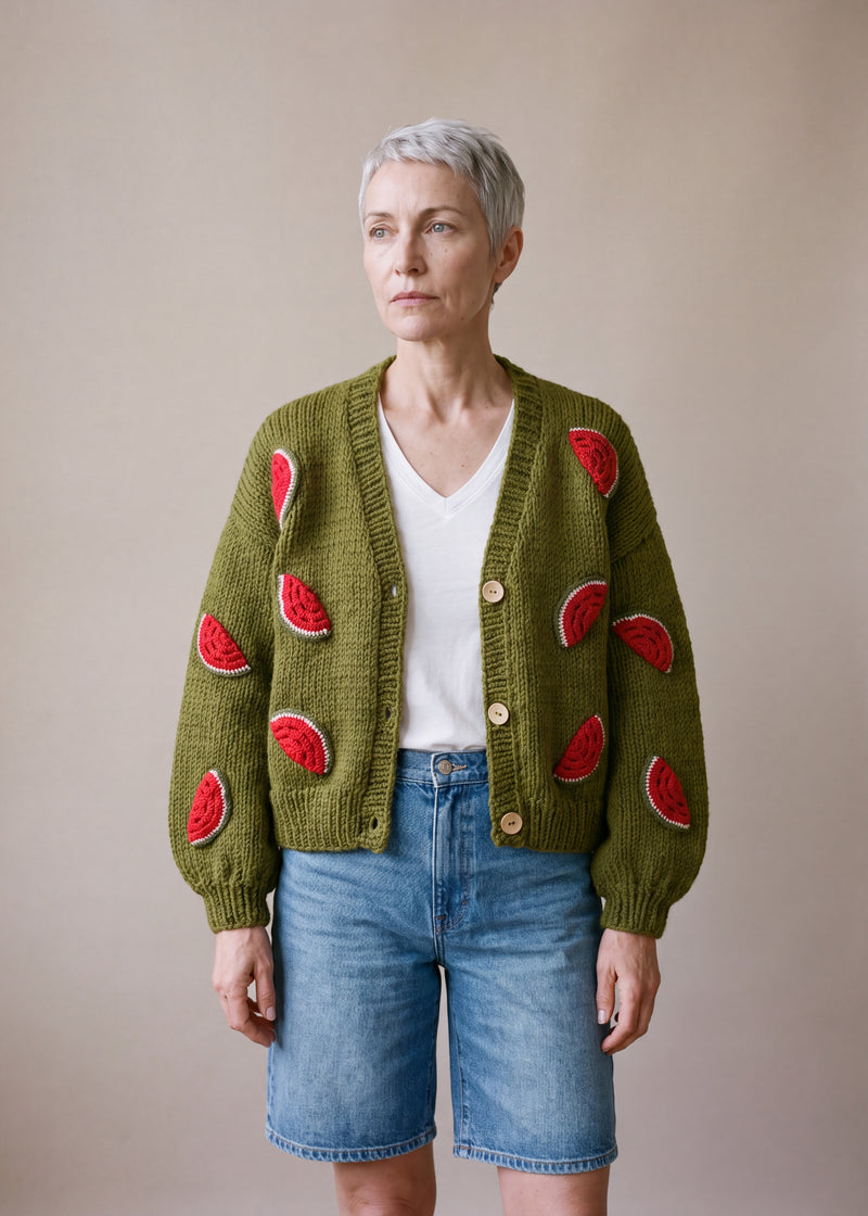 Watermelon - olive green chunky hand-knitted wool cardigan with crocheted motifs, worn open over a plain top by Ana Chic