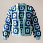 Front of the navy and aqua Ribbed Cuff Cardigan, navy squares with aqua rings and white stitch fringes - handmade by Ana Chic
