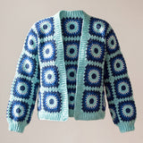 Front of the navy and aqua Ribbed Cuff Cardigan, navy squares with aqua rings and white stitch fringes - handmade by Ana Chic