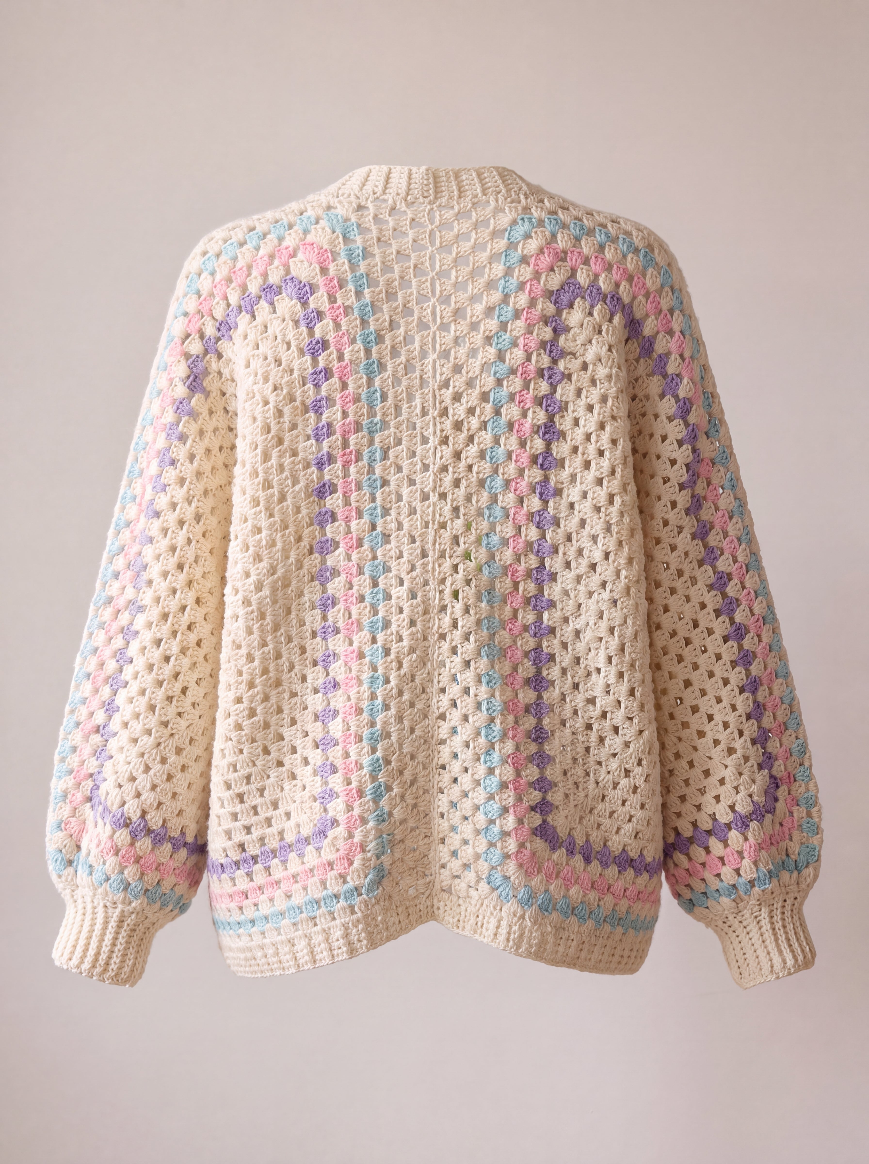 Back of an ecru hexagon crochet cardigan, two granny hexagons meeting at the centre back - handmade by Ana Chic
