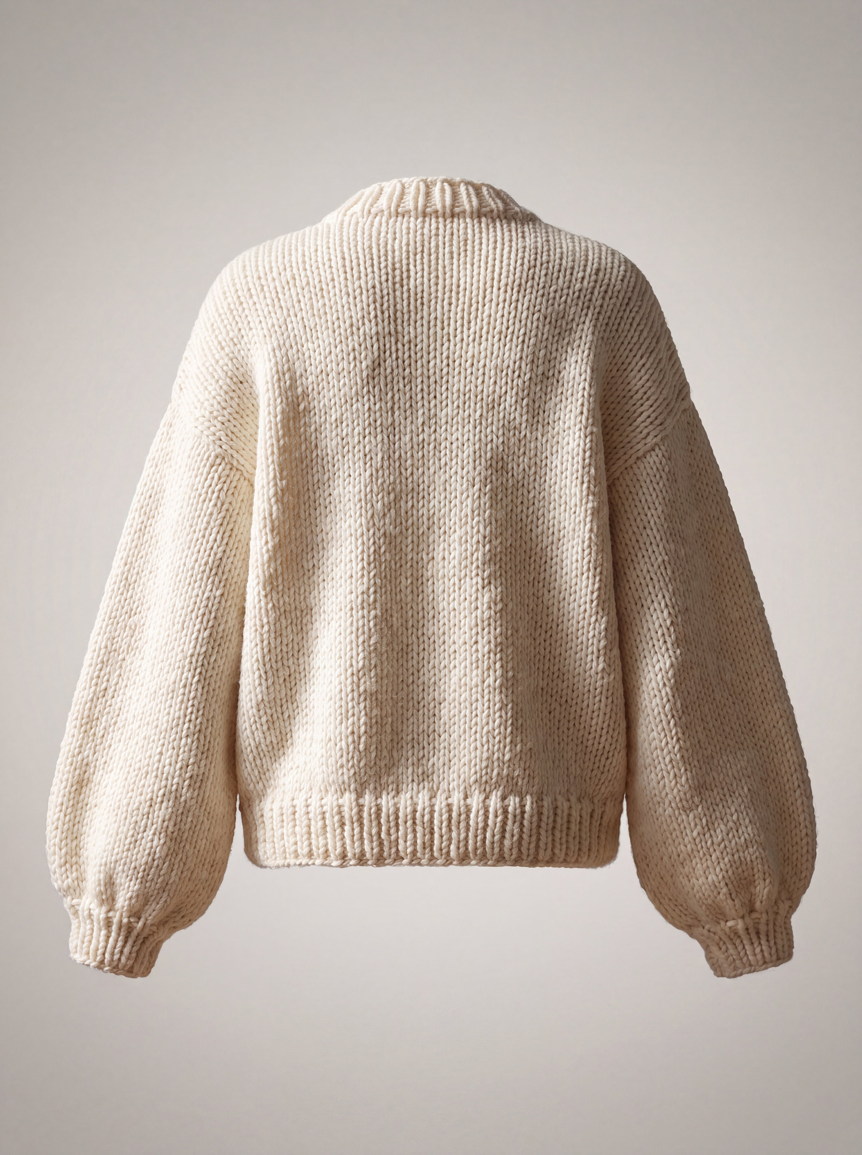Rose Cream cardigan back — plain cream chunky knit with balloon sleeves, handmade by Ana Chic
