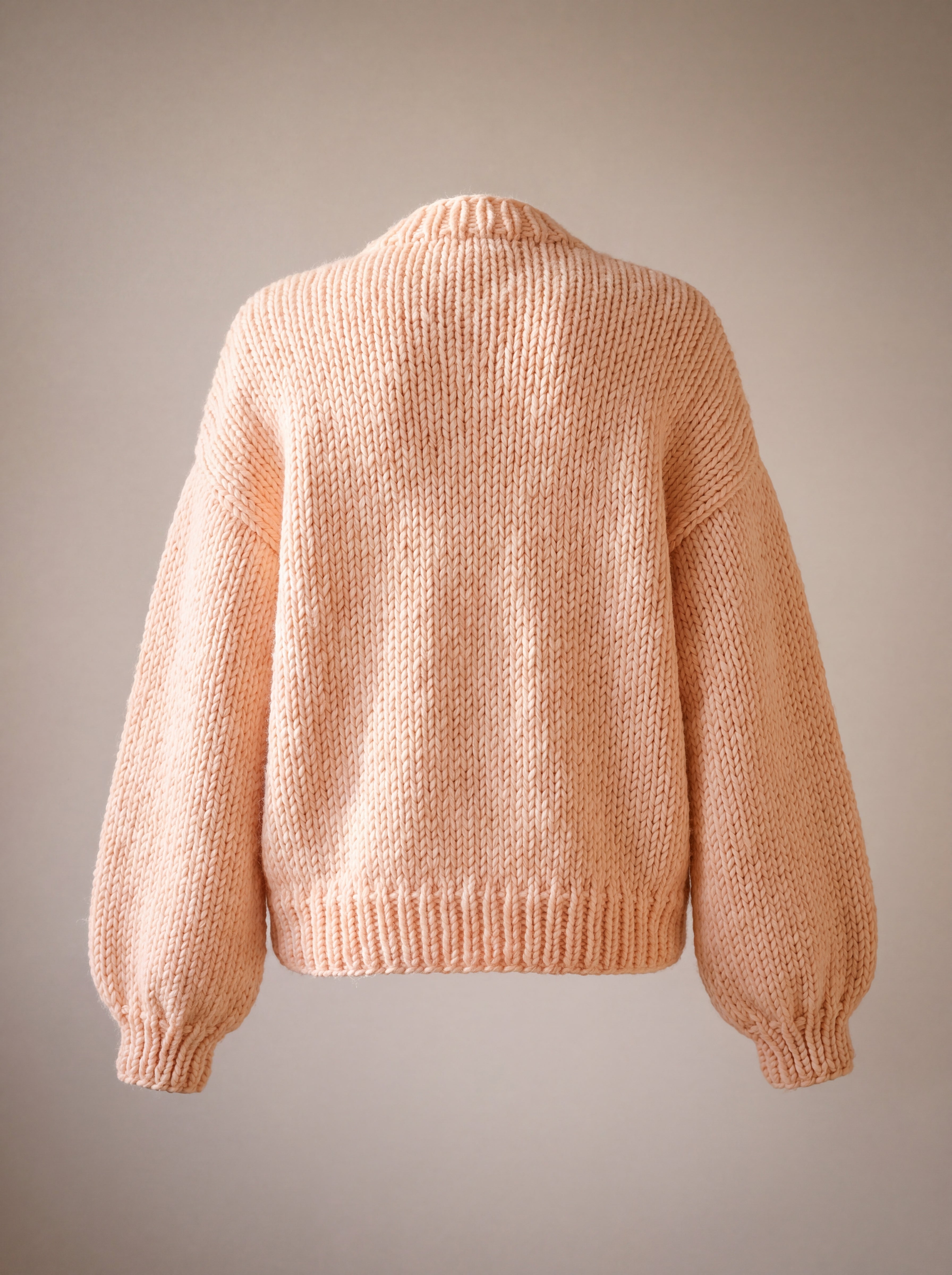 Daisy Peach cardigan back — plain peach chunky knit with balloon sleeves, handmade by Ana Chic