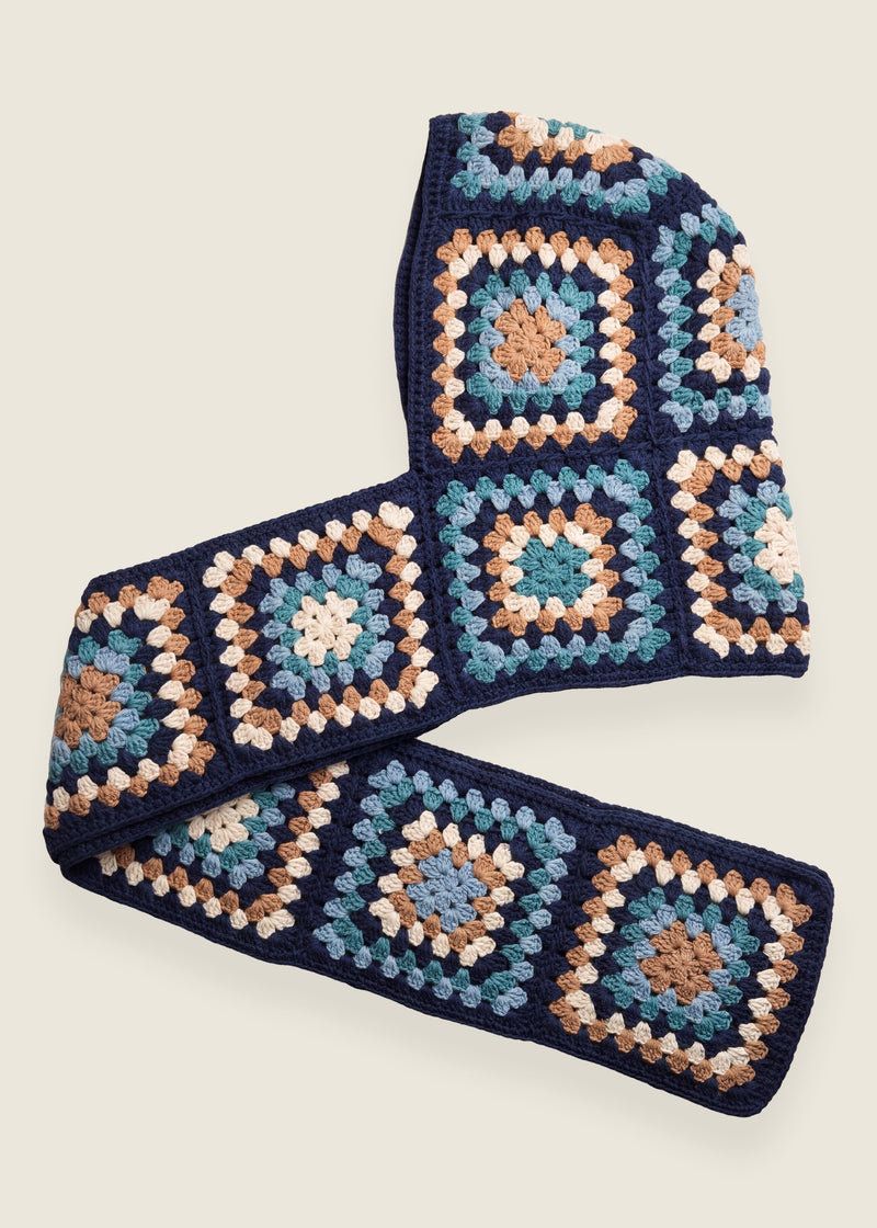 Navy granny-square crochet hooded scarf laid flat, hood and long scarf in one piece — handmade by Ana Chic