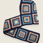 Navy granny-square crochet hooded scarf laid flat, hood and long scarf in one piece — handmade by Ana Chic