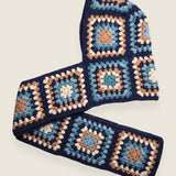 Navy granny-square crochet hooded scarf laid flat, hood and long scarf in one piece — handmade by Ana Chic