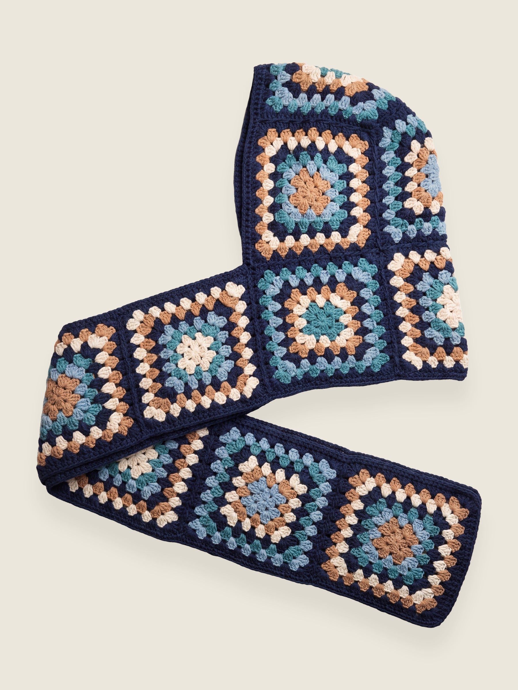 Navy granny-square crochet hooded scarf laid flat, hood and long scarf in one piece — handmade by Ana Chic