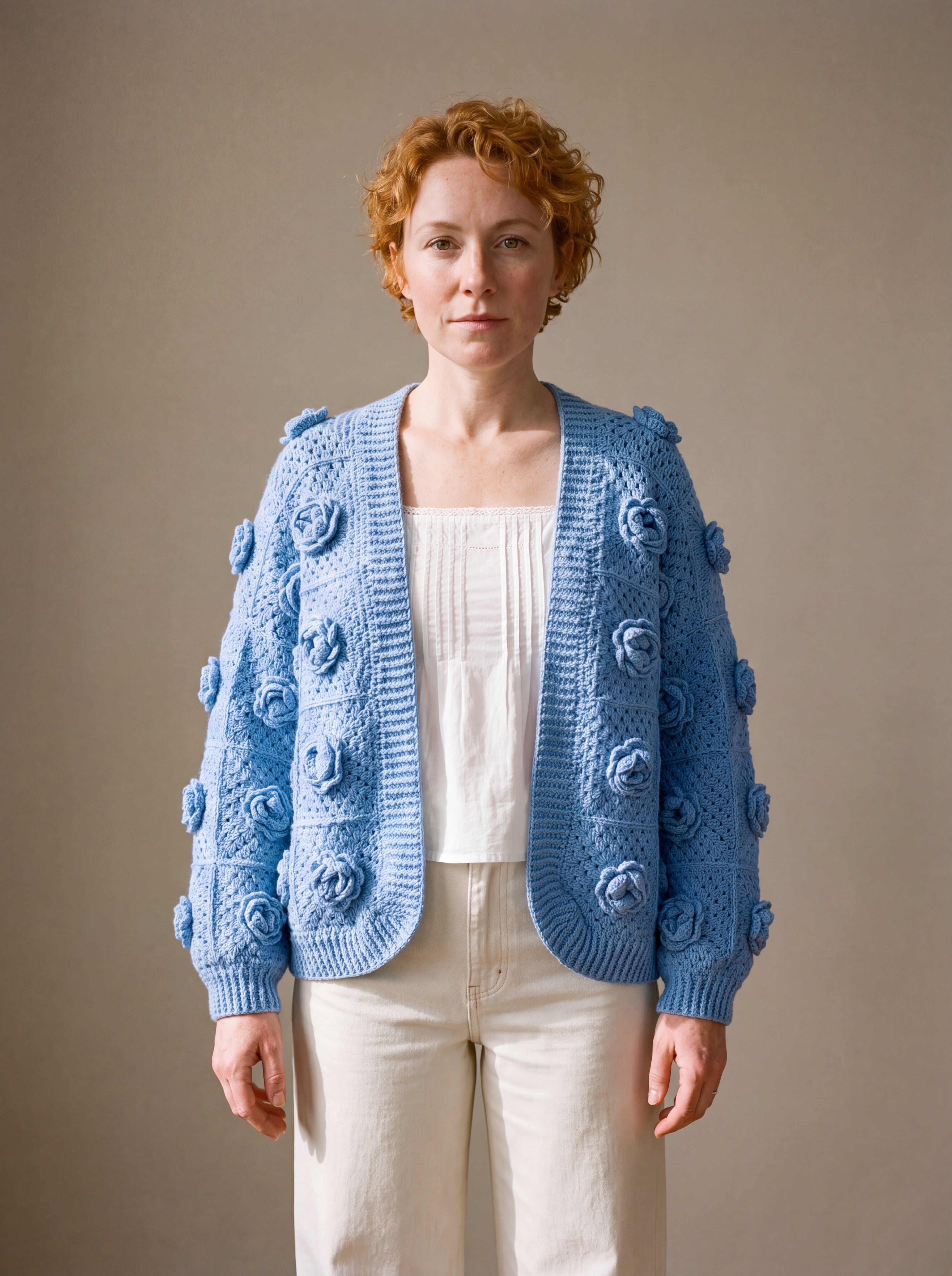 Cornflower blue rose crochet cardigan worn open over a white top and ecru jeans — handmade by Ana Chic