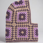 Sand and plum granny square balaclava laid flat, side view of the hood — handmade by Ana Chic