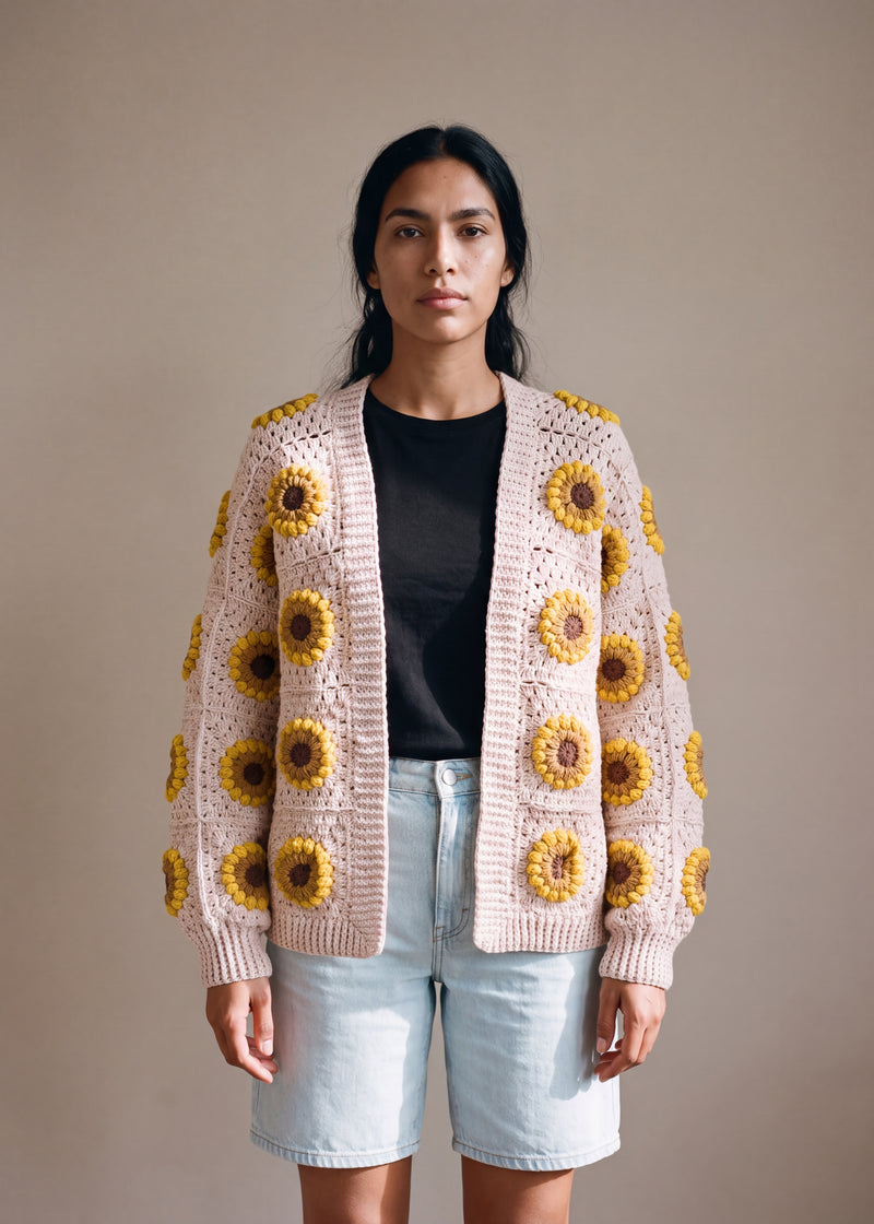 3D Sunflower Beige Cardigan - Blush pale pink-beige crocheted granny square cardigan with raised crochet sunflowers, worn by Ana Chic