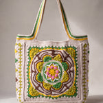Front of the green crochet tote bag with its raised crocheted medallion — handmade by Ana Chic