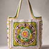 Front of the green crochet tote bag with its raised crocheted medallion — handmade by Ana Chic