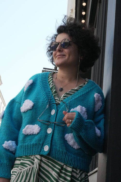 Customer in a hand-knitted cloud cardigan at the Ana Chic Brighton shop