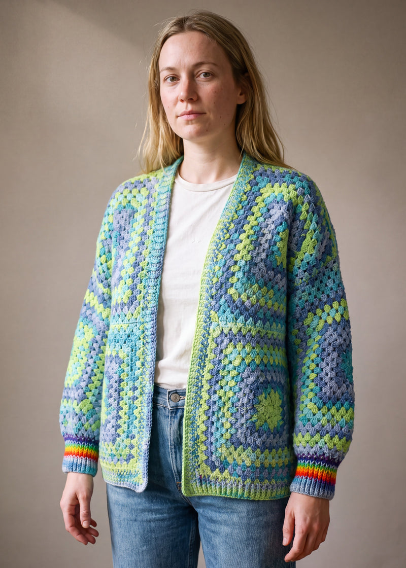 Lime, aqua and denim-blue granny square cardigan worn open over a white tee — handmade by Ana Chic