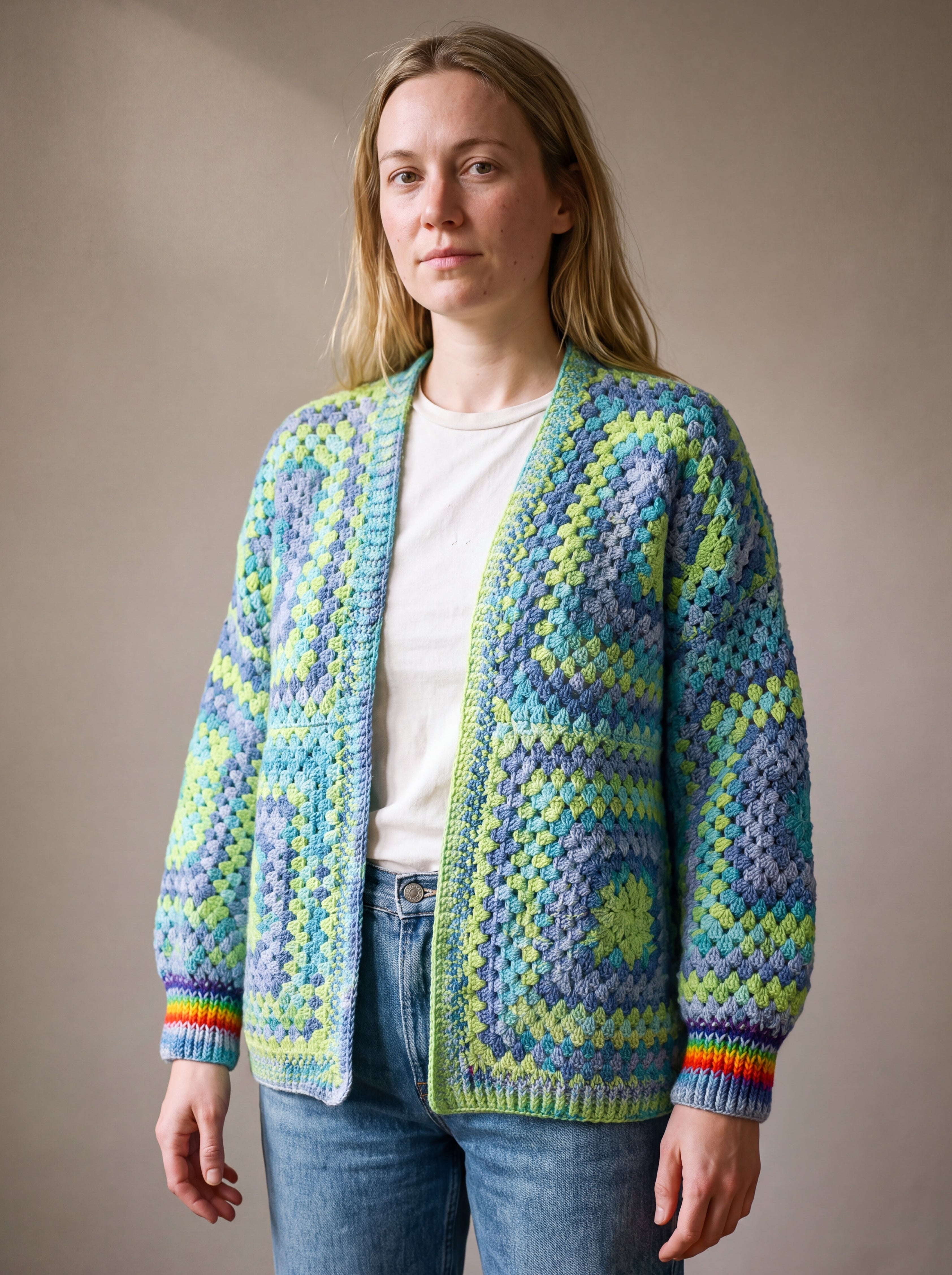 Lime, aqua and denim-blue granny square cardigan worn open over a white tee — handmade by Ana Chic