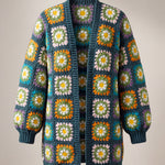 Front of the Daisy Balloon Sleeve Long Cardigan in teal, white daisy squares with yellow centres on deep teal - handmade by Ana Chic