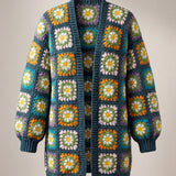 Front of the Daisy Balloon Sleeve Long Cardigan in teal, white daisy squares with yellow centres on deep teal - handmade by Ana Chic